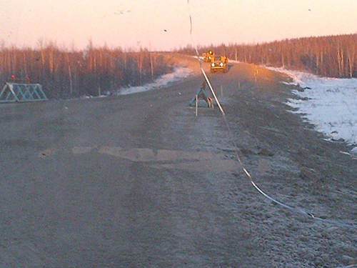 Surveying tools at construction construction site on the Inuvik to Tuktoyatuk Highway