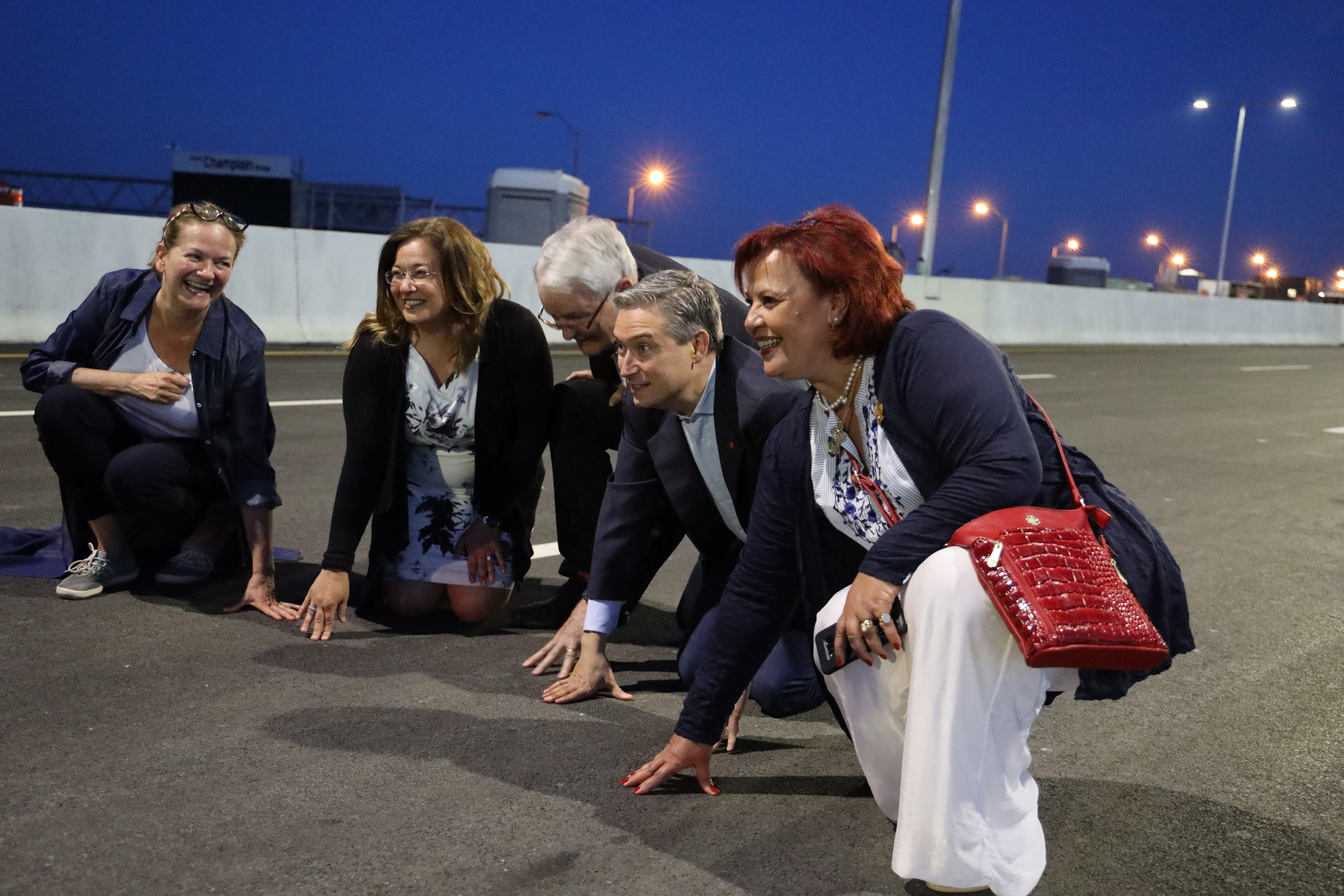 Doreen Assaad, Mayor of Brossard, Minister Garneau, Minister Champagne, MP Alexandra Mendes walking on the deck of the Samuel-De Champlain Bridge minutes before the first crossing 